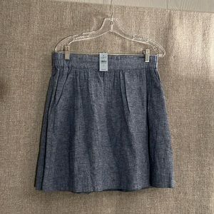 Brand NWT AnnTaylor Loft denim mini skirt! It has pockets!